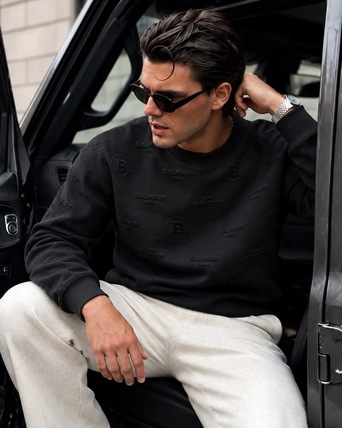 Embossed Coin Logo Crew Sweatshirt in Black